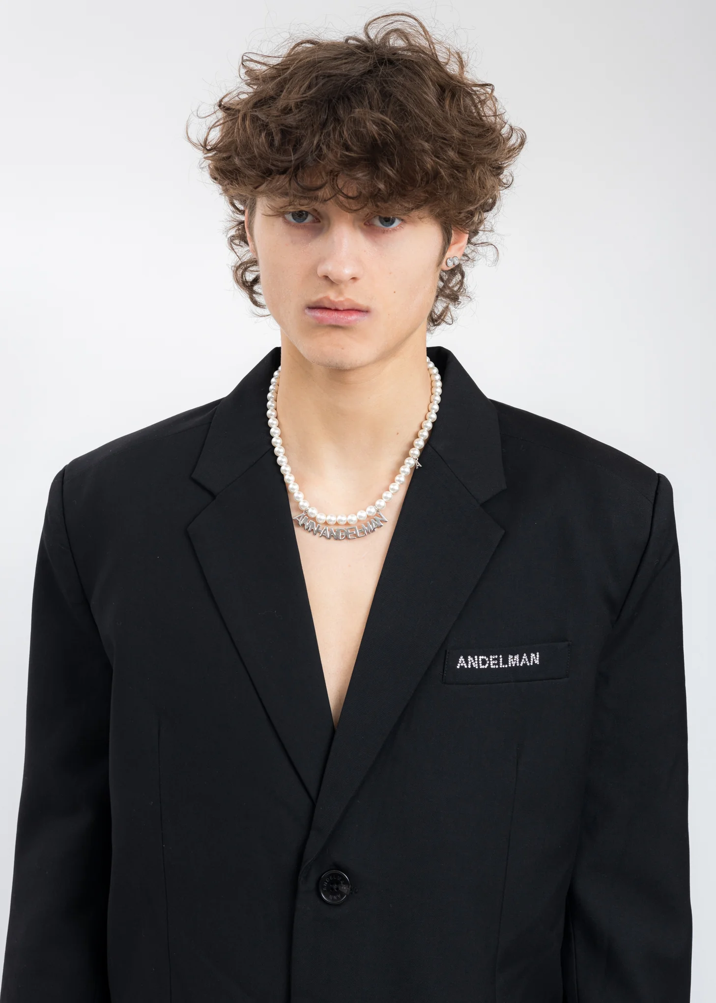 White Pearl And Silver Logo Necklace - Image 2