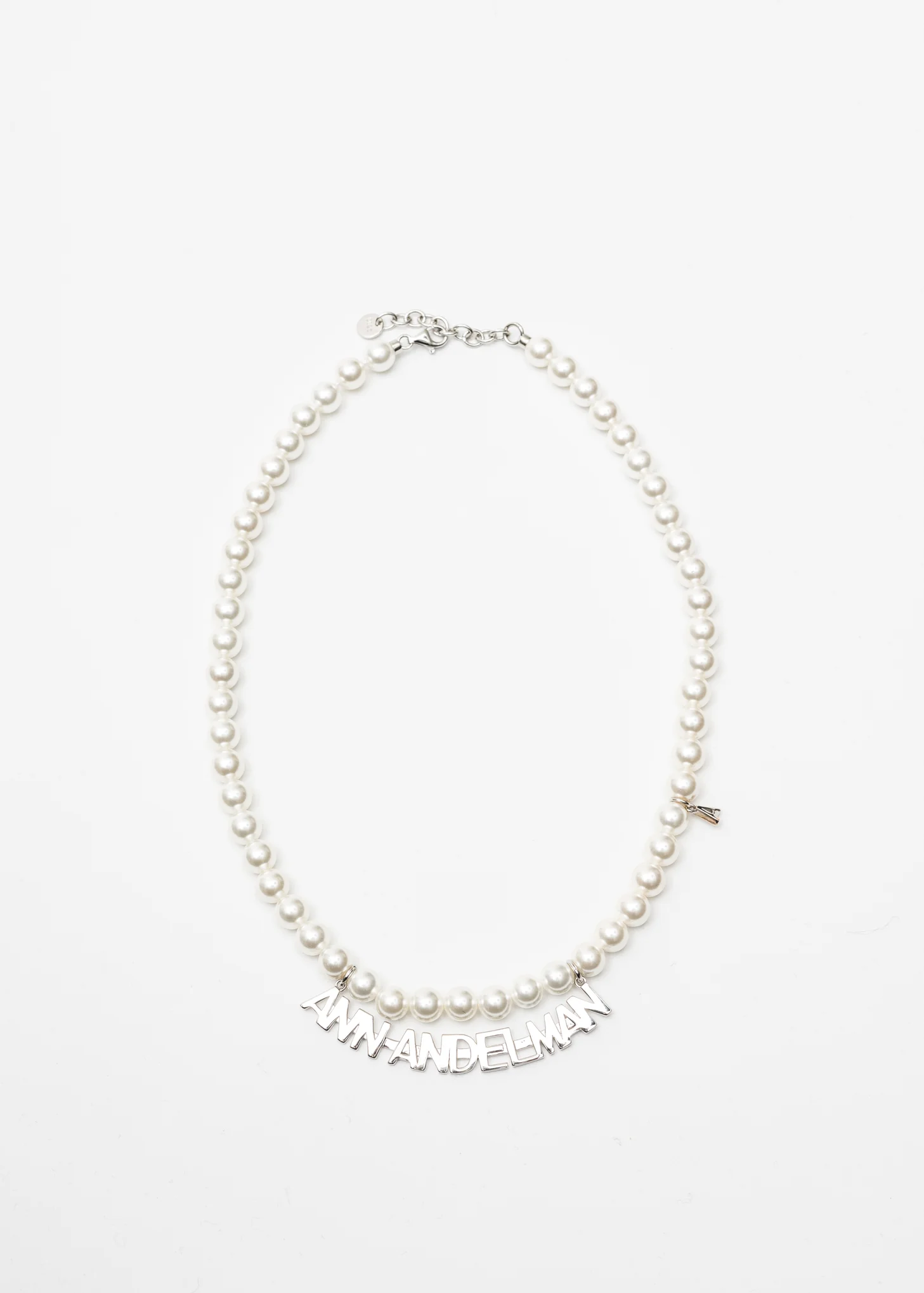 White Pearl And Silver Logo Necklace - Image 5