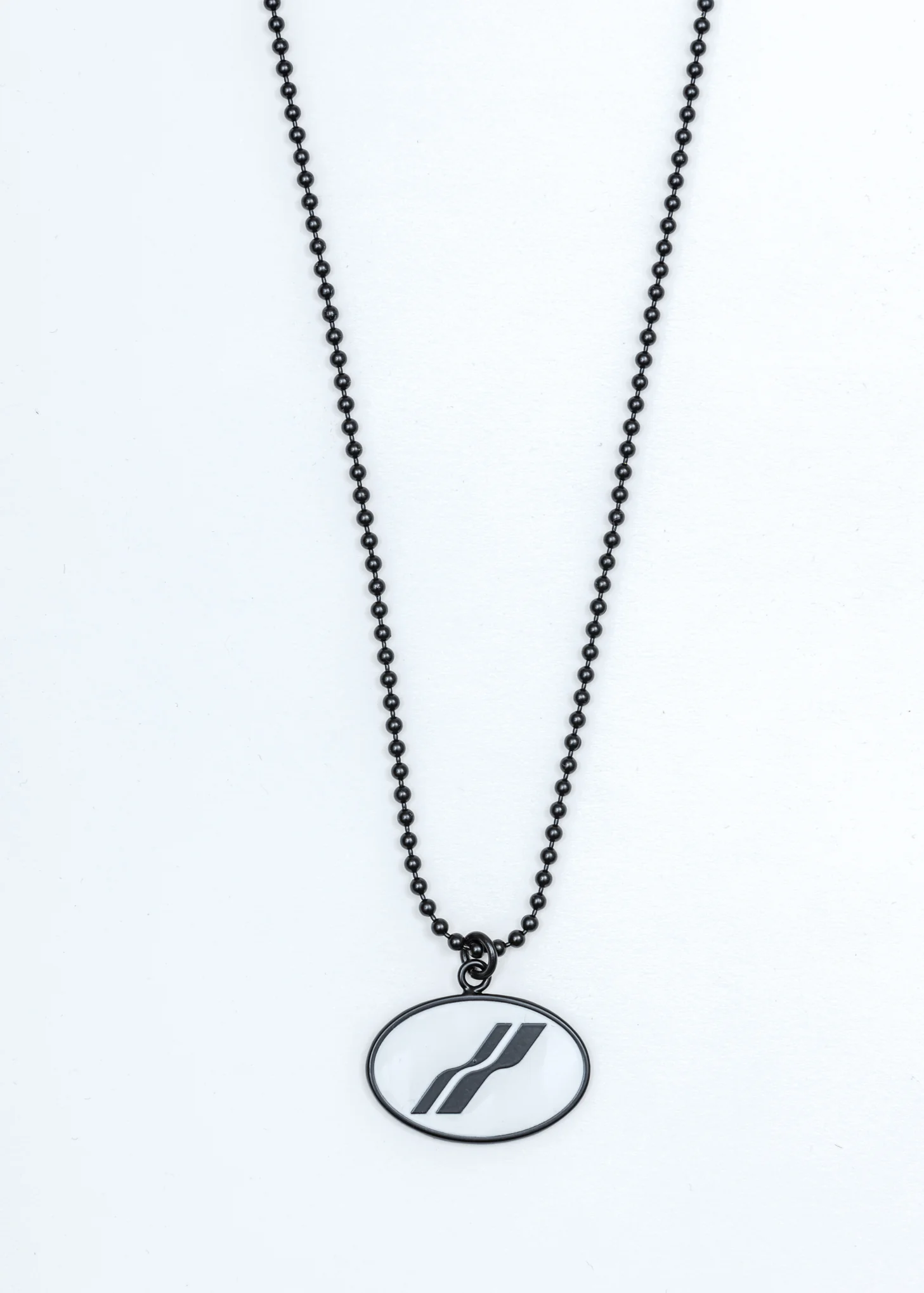 Black and White Oval Logo Necklace - Image 3