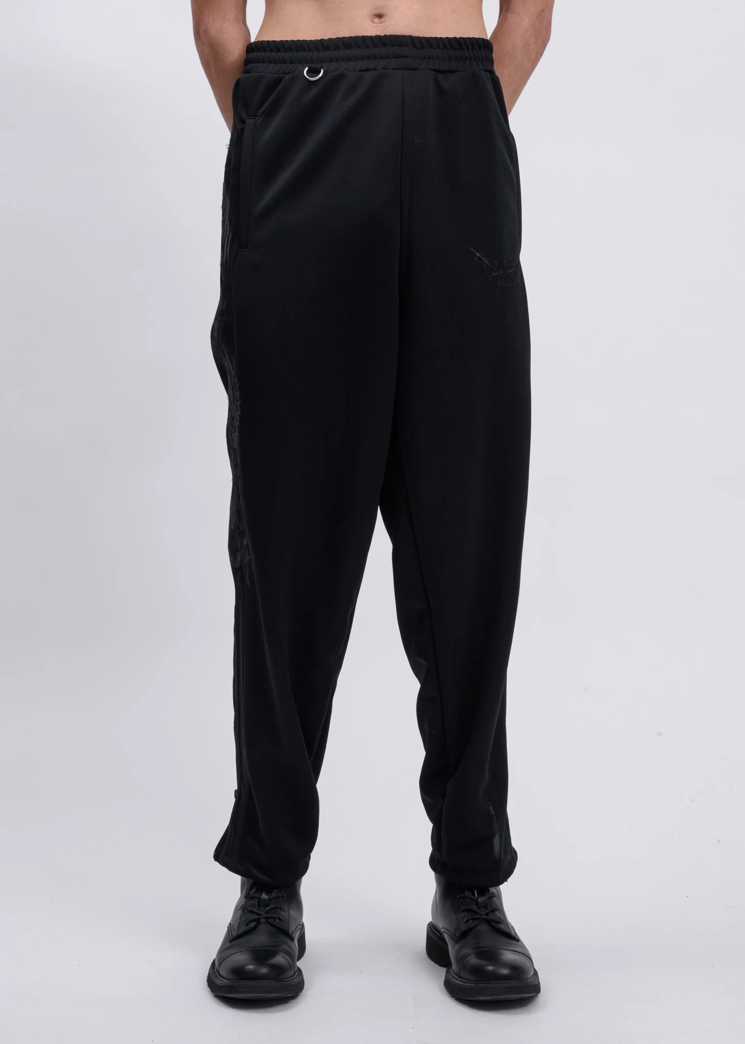 Black Chaos Embroidery Track Pants