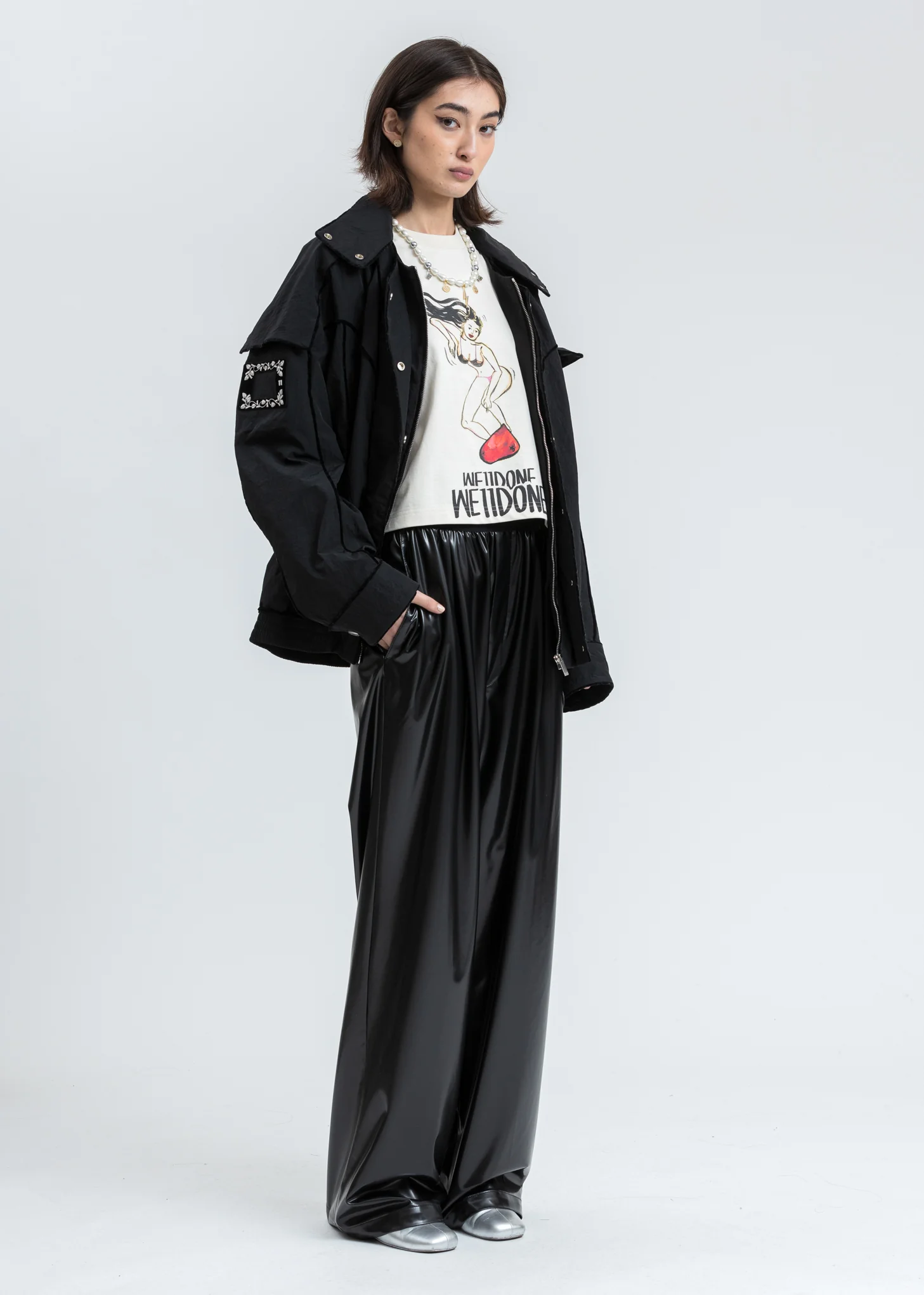 Black Logo Latex Textured Trousers - Image 7