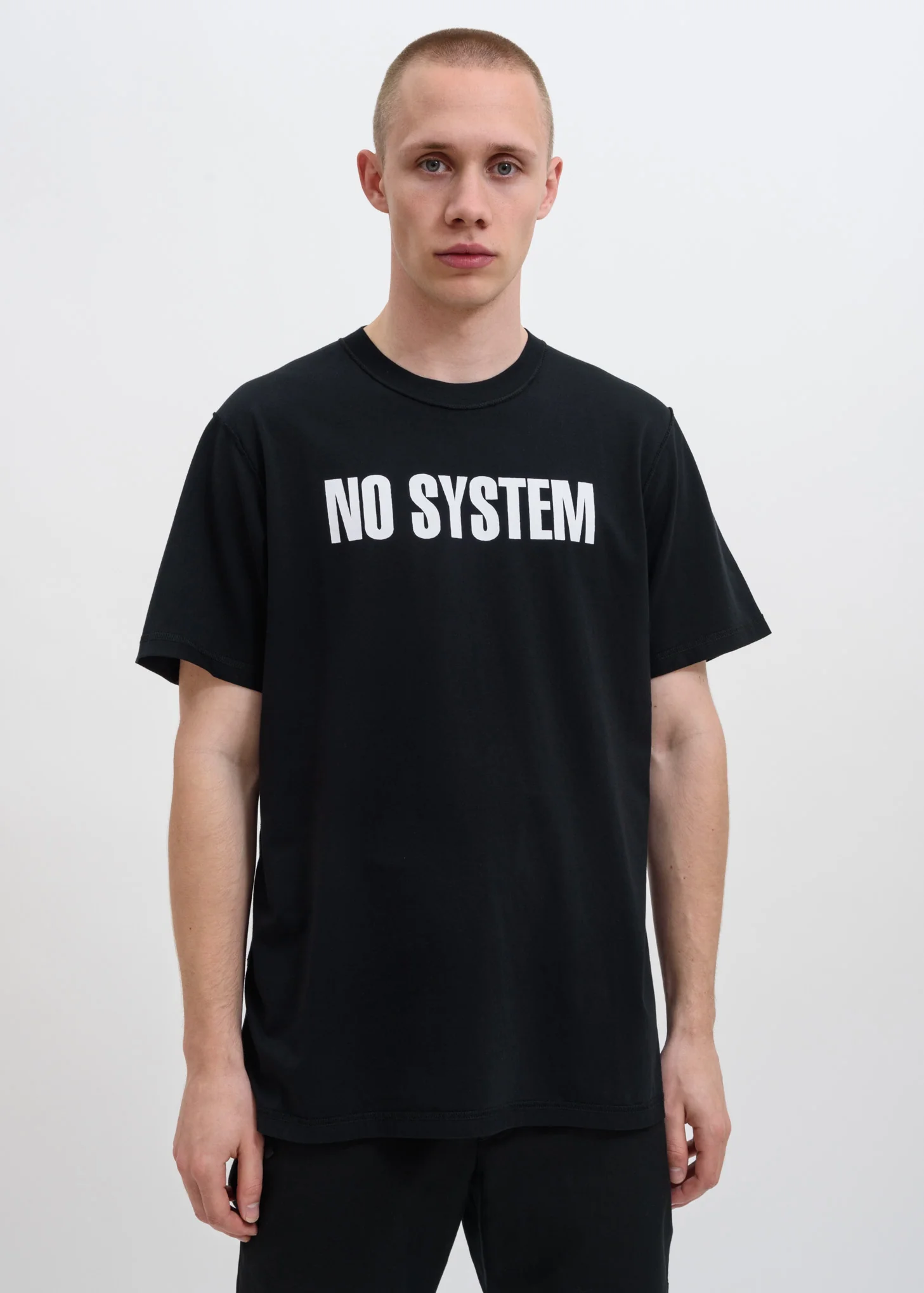 Black “NO SYSTEM” T-Shirt