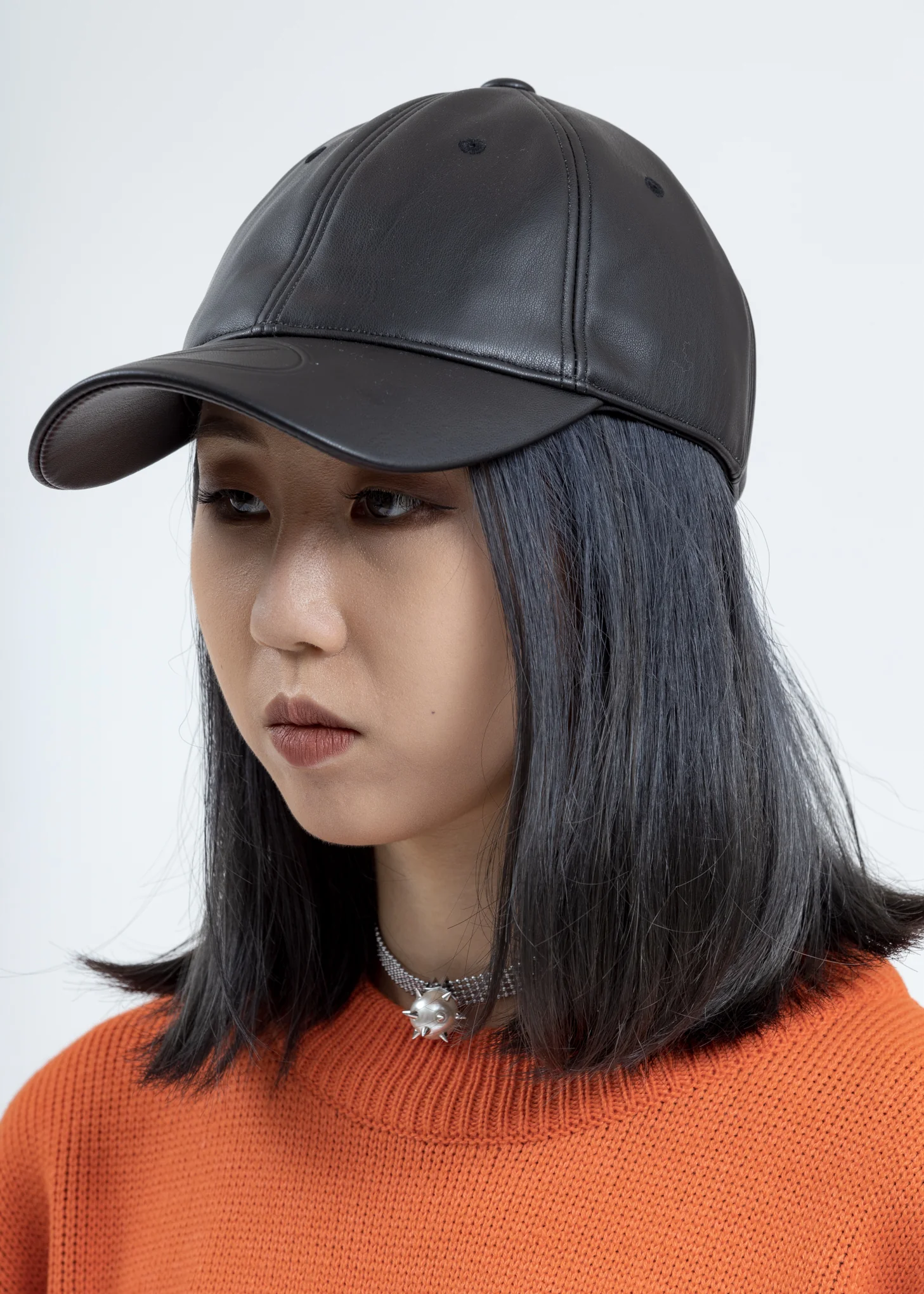 Black WD Embossed Logo Fake Leather Cap