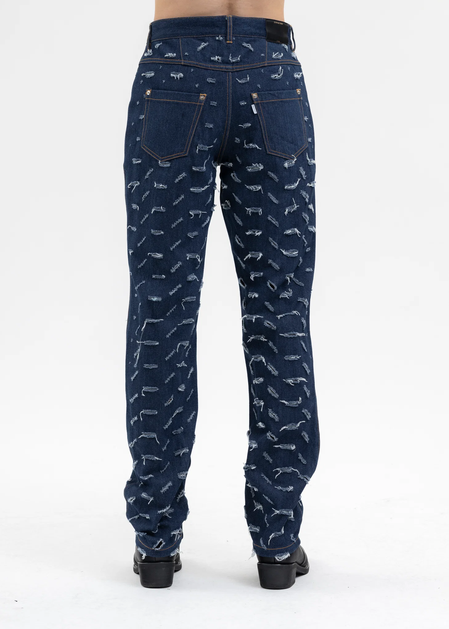 BLUE SLASHED DENIM TROUSERS WITH ASYMMETRIC BELTS - Image 2