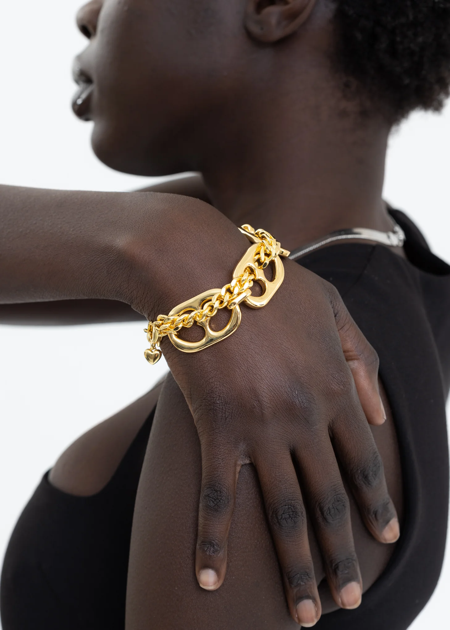 Gold Chains And Two Way Hearts Bracelets - Image 2