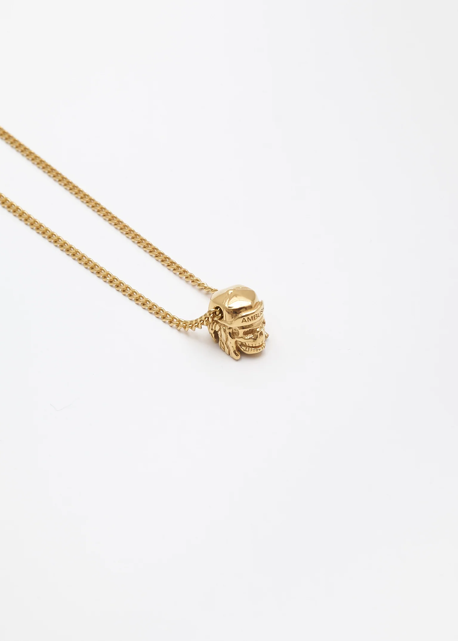 Gold Nobo Skull Charm Necklace