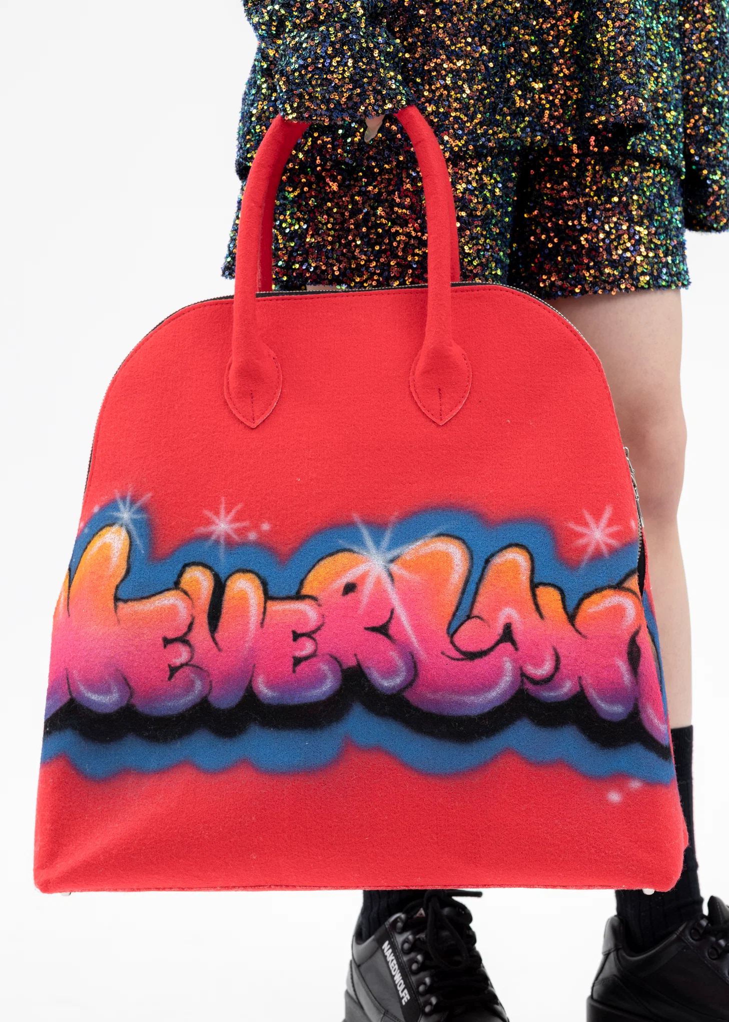 "NEVERLAND" RED CARPET TRAVELLER BAG - Image 5
