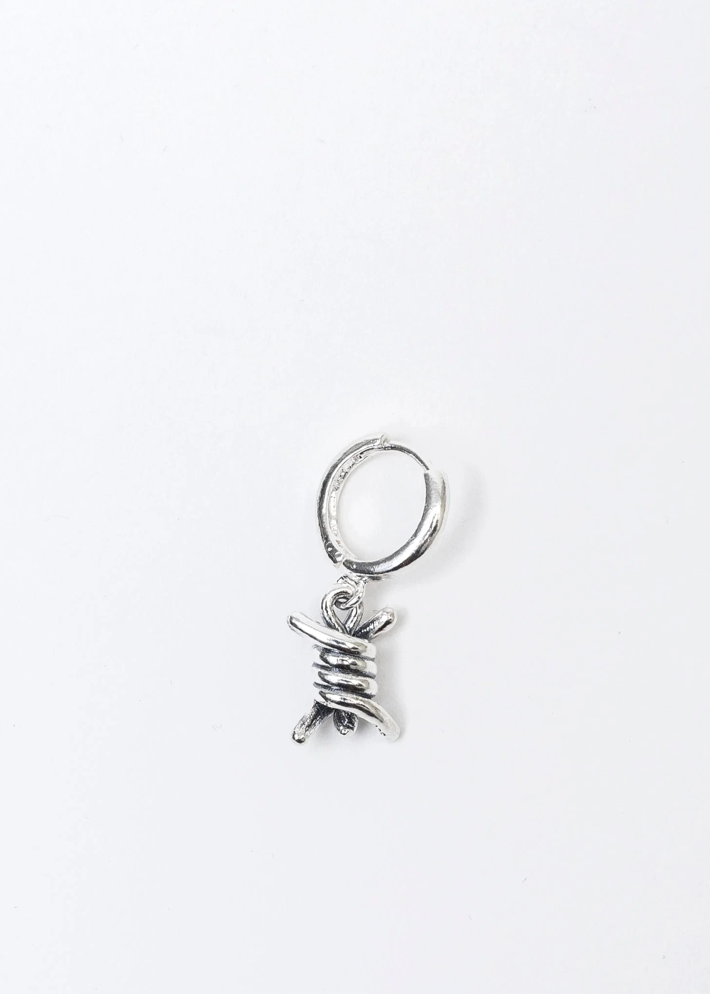 SILVER TWIDDLE EARRING