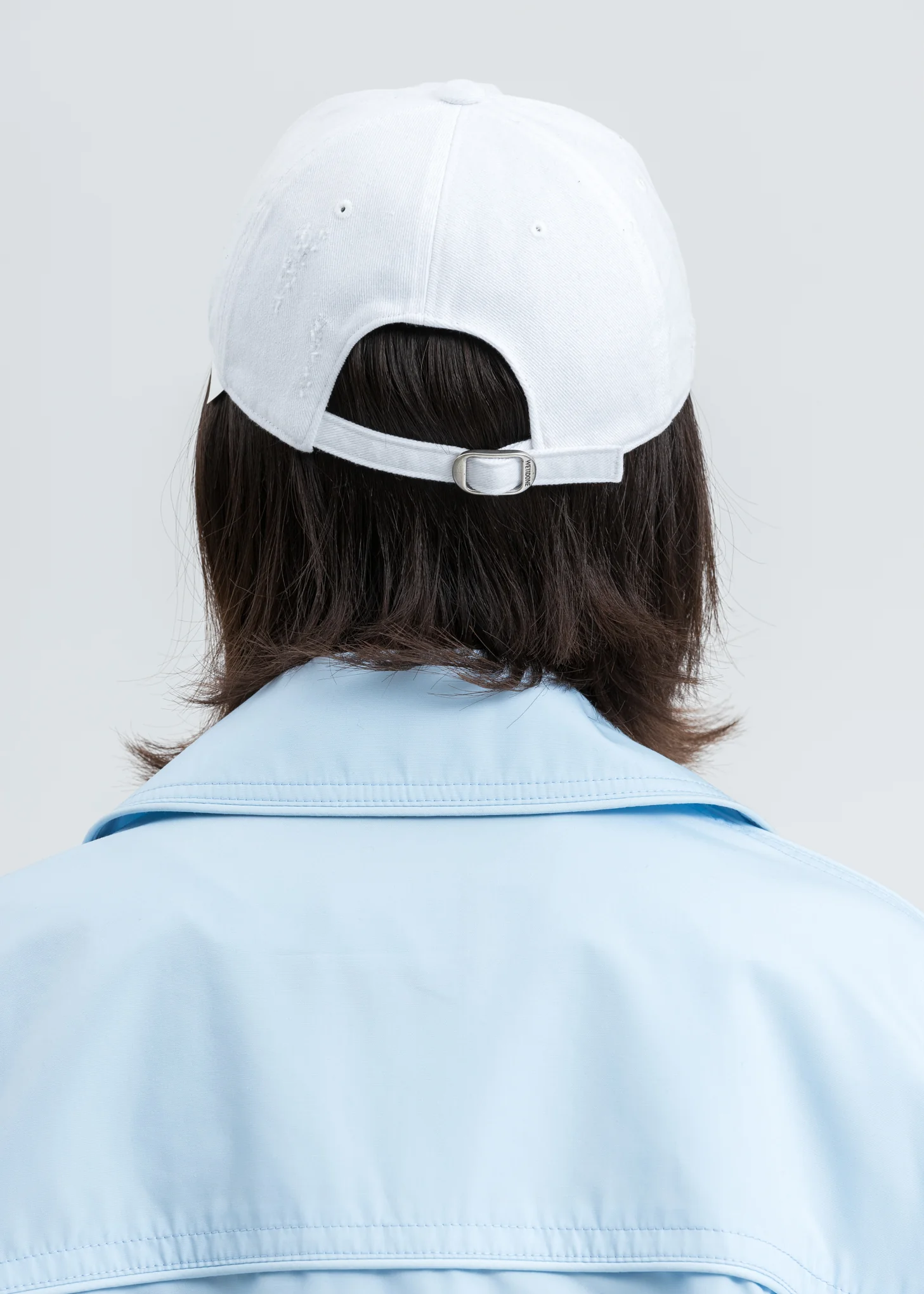 White Damaged Logo Cap - Image 2