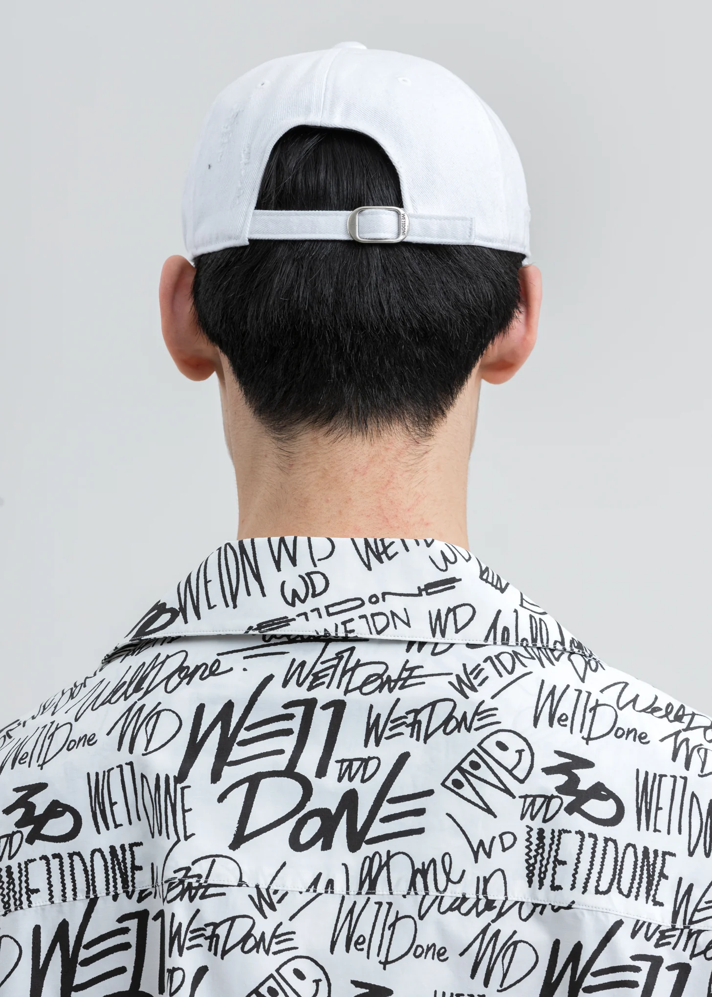White Damaged Logo Cap - Image 3